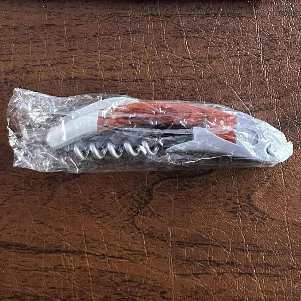 NIB Neiman Marcus Corkscrew and Bottle Opener in Red Leather Case